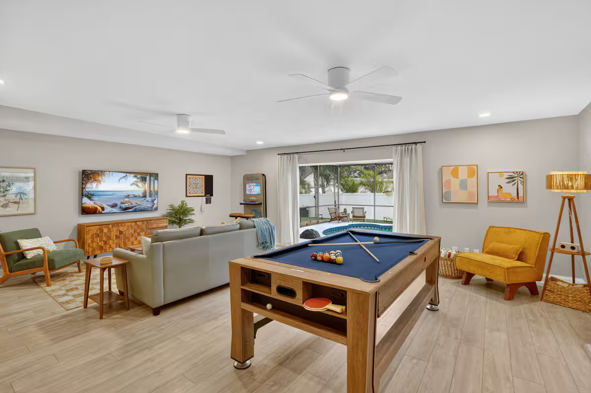 Game room with pool table and arcade